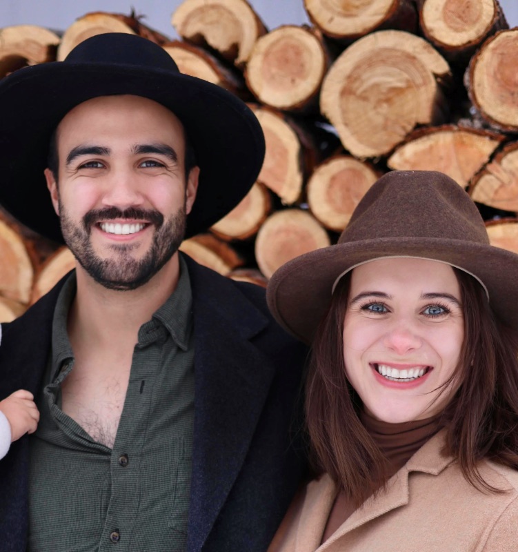 Forrest and Marielle, in front of the woodpile.